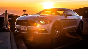 4k Ultra Hd Mustang With Sunset Wallpaper