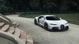 4k White Car By Stairs Wallpaper