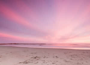 A Beautiful Pastel Beach In The Sunshine Wallpaper