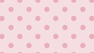 A Beautiful Pattern Of Pink And White Polka Dots. Wallpaper