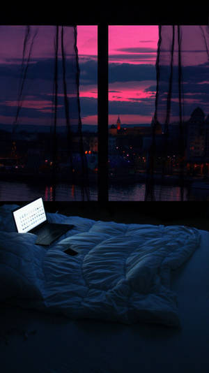 A Bed With A Laptop Wallpaper