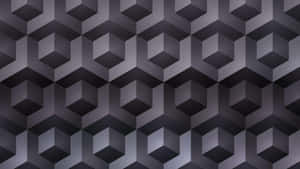 A Black And Gray Geometric Pattern Wallpaper