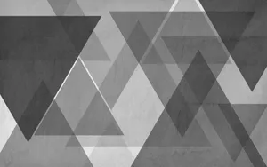 A Black And White Abstract Pattern With Triangles Wallpaper