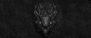 A Black And White Image Of A Skull On A Wall Wallpaper