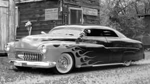 A Black And White Photo Of A Classic Car Wallpaper