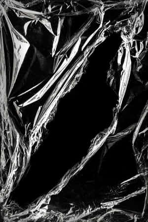 A Black And White Photo Of A Plastic Wrap Wallpaper