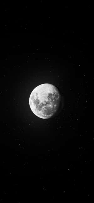 A Black And White Photo Of The Moon Wallpaper