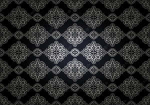 A Black And White Wallpaper With An Ornate Pattern Wallpaper