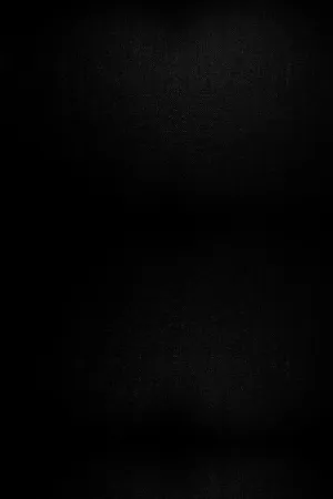 A Black Background With A Light Shining On It Wallpaper