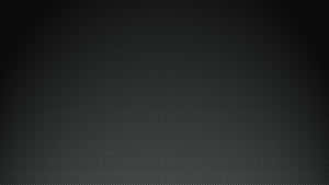 A Black Background With A Light Texture Wallpaper