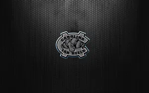 A Black Background With A Logo On It Wallpaper