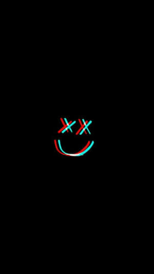 A Black Background With A Smiling Face On It Wallpaper