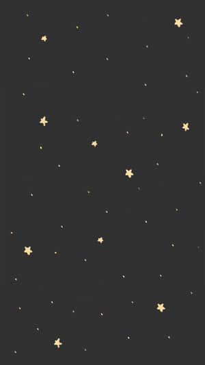 A Black Background With Gold Stars On It Wallpaper