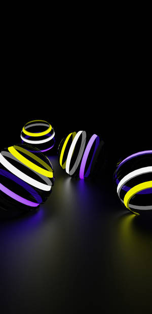 A Black Background With Several Colorful Rings Wallpaper