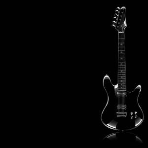 A Black Electric Guitar On A Black Background Wallpaper