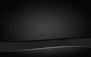 A Black Leather Background With A Silver Strip Wallpaper