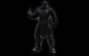 A Black Man In A Dark Suit Wallpaper