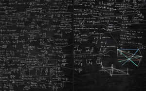 A Blackboard With Many Formulas Written On It Wallpaper