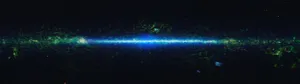 A Blue And Green Galaxy In Space Wallpaper