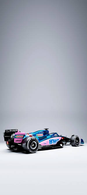 A Blue And Pink Racing Car On A Grey Background Wallpaper