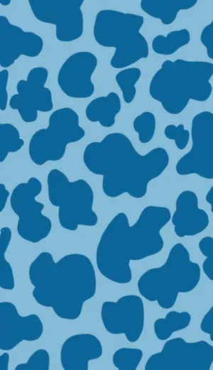 A Blue And White Cow Print Pattern Wallpaper