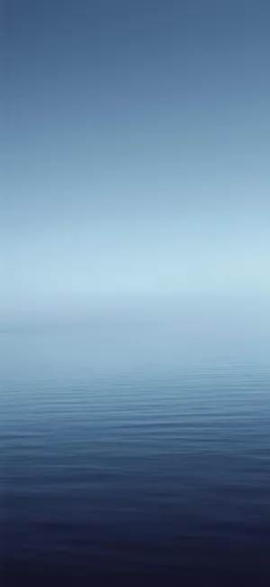 A Blue Ocean With A White Horizon Wallpaper