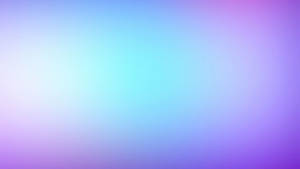 A Blurred Background With Blue And Purple Colors Wallpaper