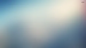 A Blurry Background With A Blue Sky Wallpaper