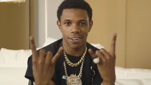 A Boogie Wit Da Hoodie Captures His Dramatic Style On Stage Wallpaper