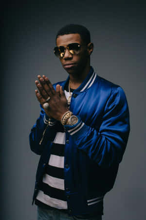 “a Boogie Wit Da Hoodie Performing On Stage” Wallpaper