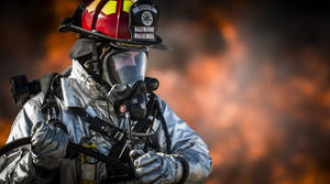 A Brave Fireman Ready For Action Wallpaper