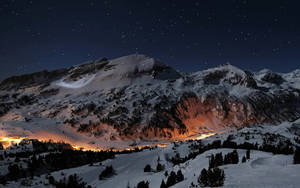 A Breathtaking Winter Panorama Of The Swiss Alps. Wallpaper