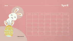 A Bright And Cheerful April 2022 Calendar Featuring A Cute Pink Bunny. Wallpaper