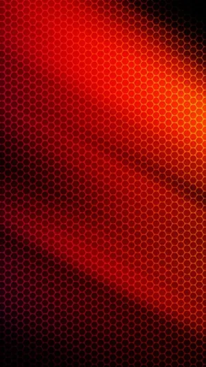 A Bright Red, Yellow And Orange Sunrise Casting Brilliant Colors Across An Expansive Mountain Range. Wallpaper