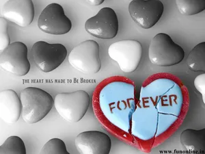 A Broken Heart Signifying The End Of A Relationship Wallpaper