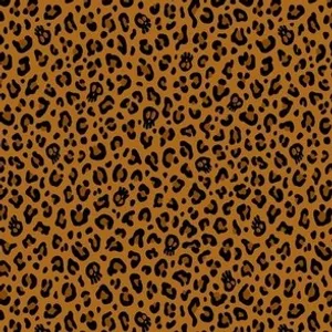 A Brown And Black Leopard Print Fabric Wallpaper
