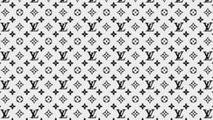 A Chic And Stylish Louis Vuitton Pattern Wallpaper