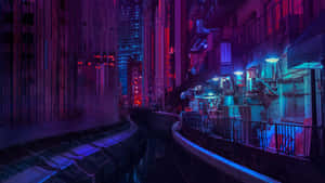 A City At Night With Neon Lights And Buildings Wallpaper