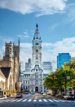 A City Street With A Clock Tower And A City Hall Wallpaper