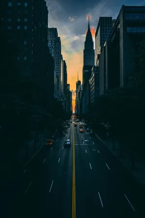 A City Street With Cars Wallpaper