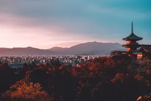 A City With A Pagoda In The Background Wallpaper