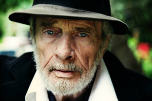 A Classic Black And White Portrait Of The Legendary Country Music Artist, Merle Haggard. Wallpaper