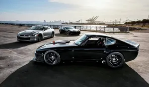 A Classic Red Datsun On The Open Highway. Wallpaper