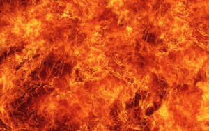 A Close Up Of A Fire Background Wallpaper