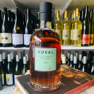 A Closeup Of A Premium Koval Single Barrel Oat Whiskey Bottle Wallpaper