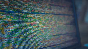 A Computer Screen With A Lot Of Code On It Wallpaper