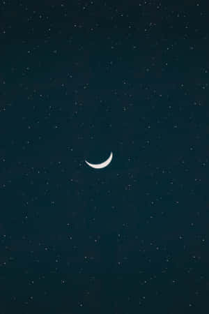 A Crescent In The Sky With Stars Wallpaper