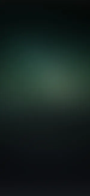 A Dark Green Background With A Blurred Background Wallpaper