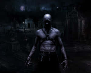A Dark Man Standing In A Cemetery Wallpaper
