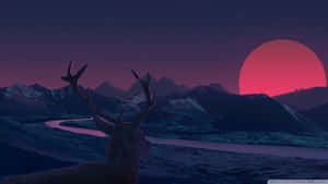 A Deer Is Standing In The Mountains With A Red Sunset Wallpaper
